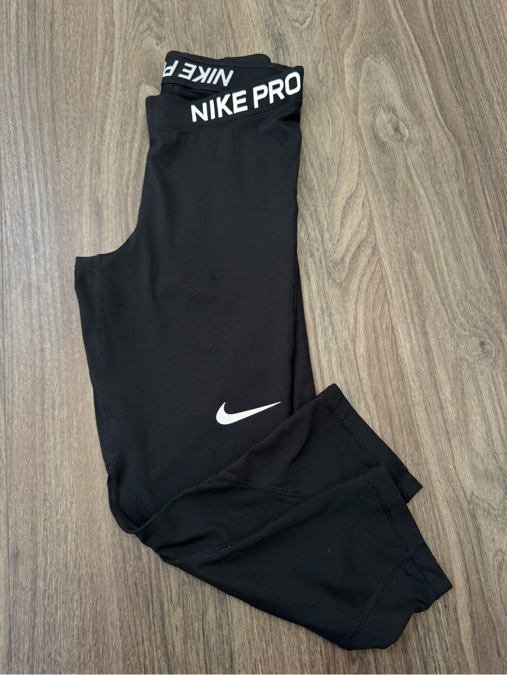Nike Black Cropped Performance Leggings with White Swoosh